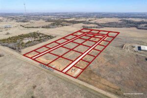 An overview look of a parcel of land for sale in Stillwater, Ok with red boundary lines.