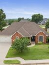 A beautiful single family home on bright green lawn plot supporting an article for the cost of living in stillwater ok